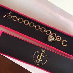 Juicy Couture gold B-Pave Heart Starter Charm.